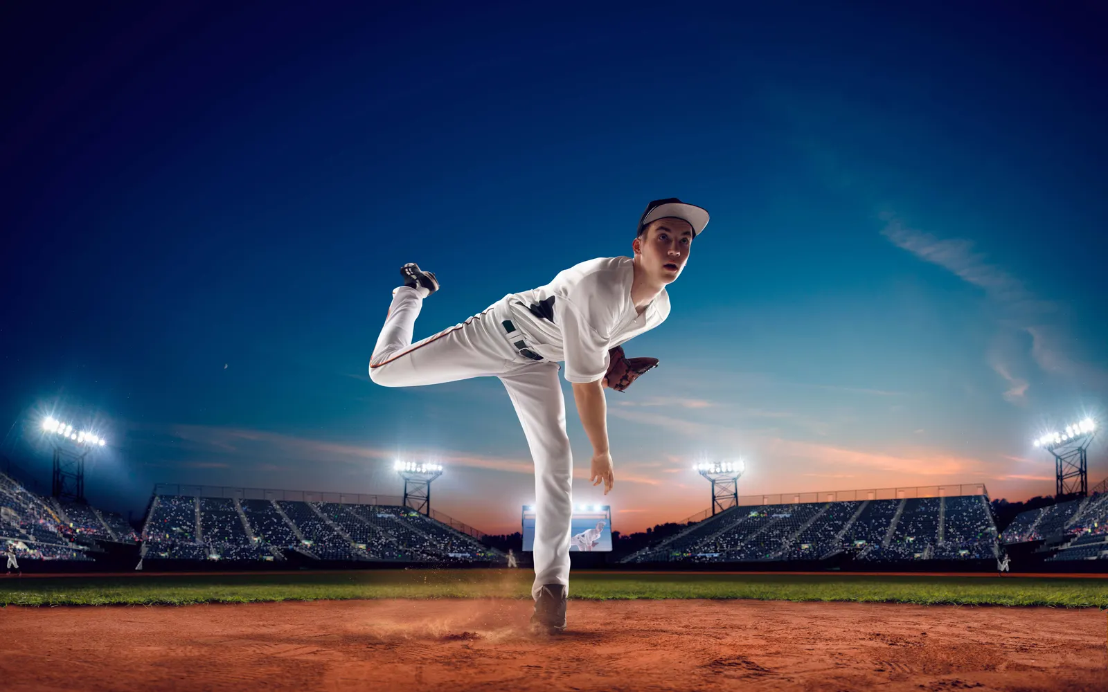 Baseball pitcher throwing under stadium lights, where the pitch clock sets the pace