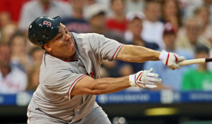 PHILADELPHIA - JUNE 16: Bartolo Colon #40 of the Boston Red Sox loses his helmet while swinging at the ball during the game against the Philadelphia Phillies at Citizens Bank Park June 16, 2008 in Philadelphia, Pennsylvania. The Phillies won 8-2. (Photo by Drew Hallowell/Getty Images)