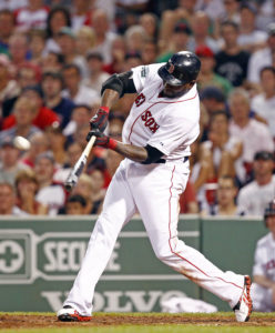 Jun 20, 2012; Boston, MA, USA; Boston Red Sox designated hitter David Ortiz (34) hits a grand slam against the Miami Marlins during the fourth inning at Fenway Park.  Mandatory Credit: Mark L. Baer-US PRESSWIRE
